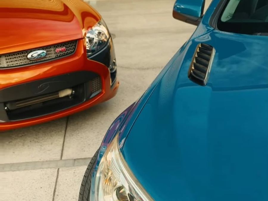 Blue HSV Gen-F front end beside an orange FPV